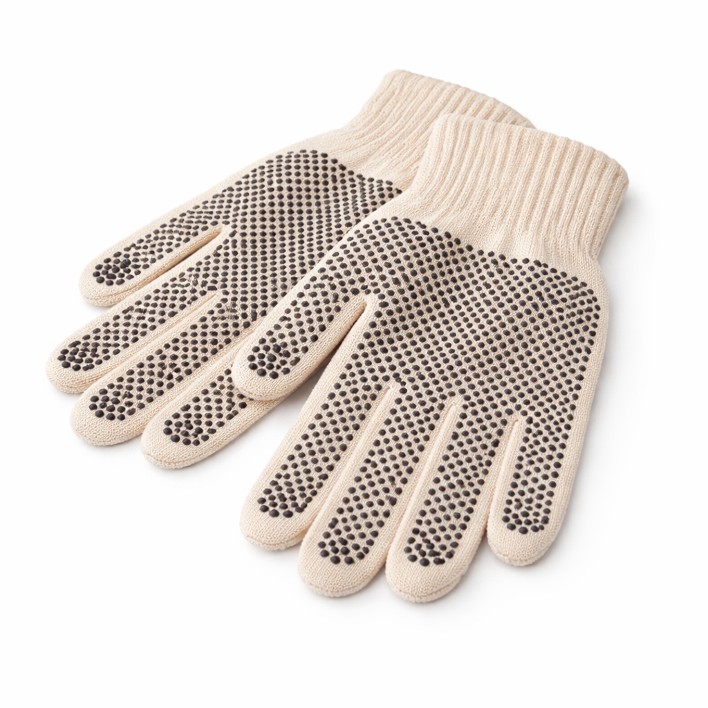 Pair of beige gloves with textured palm on a white background