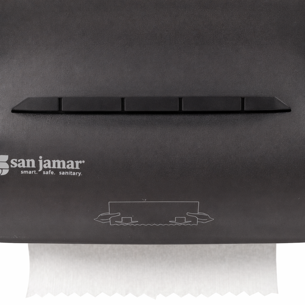 Black paper towel dispenser with San Jamar logo on a gray background